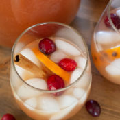 Christmas punch in glass with cinnamon stick