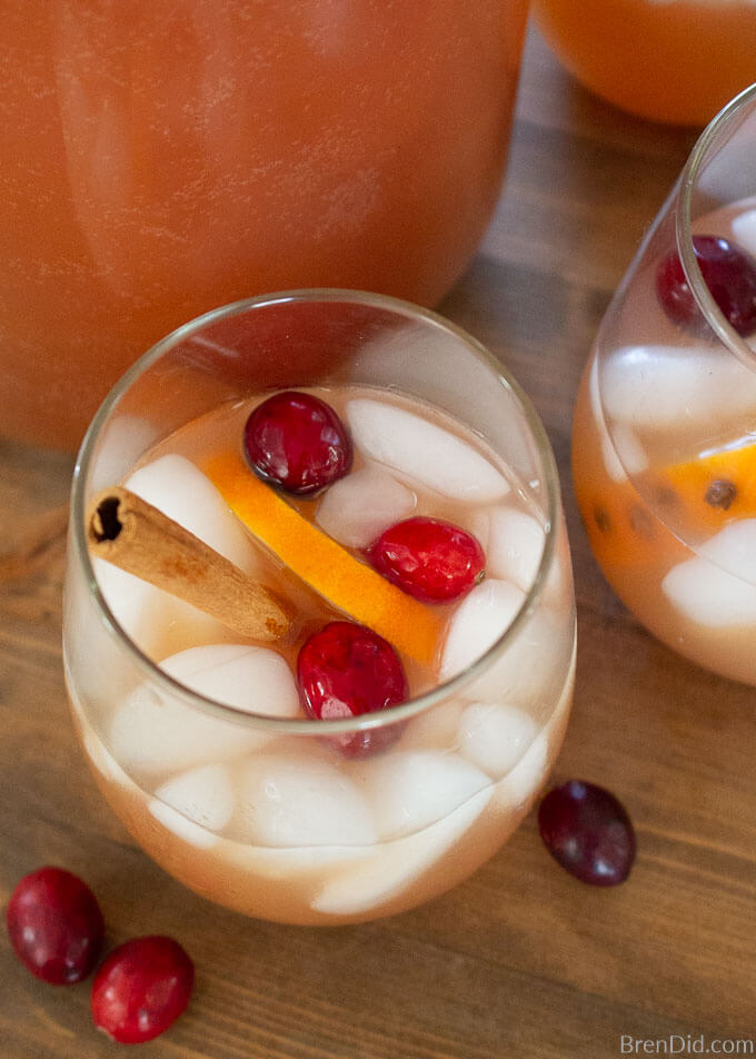Christmas punch in glass with cinnamon stick
