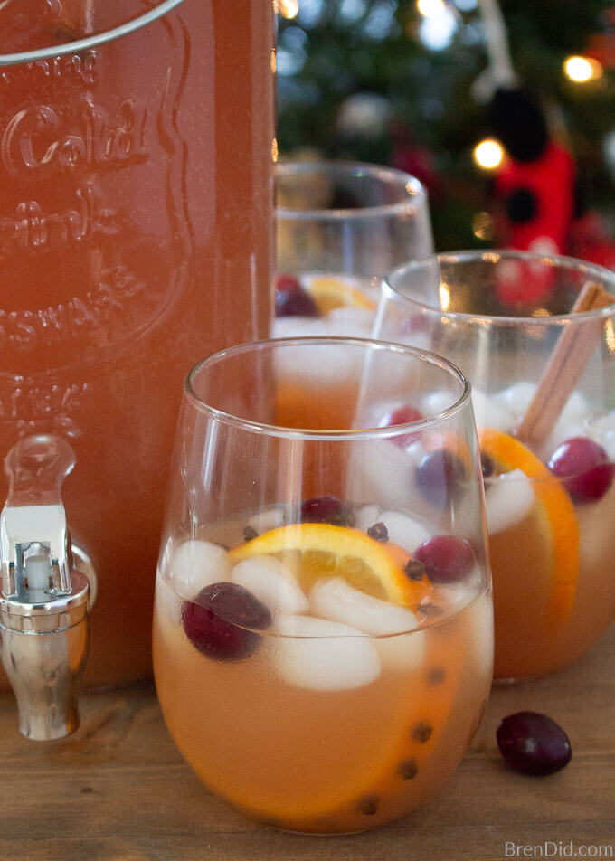 Christmas punch in glasses with dispenser