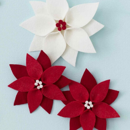 white and red poinsettia felt bows