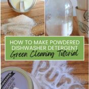 A clear glass mason jar filled with white homemade dishwasher detergent powder, featuring a printable label and a clean mugs resting nearby.